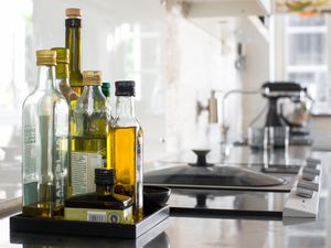 different types of olive oil on the counter 