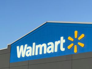 The Walmart logo on the exterior of a building