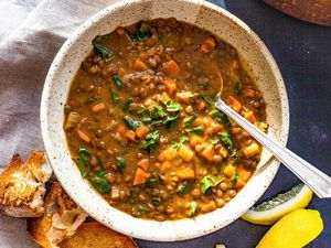 Easy Lentil Soup in a bowl with a spoon.