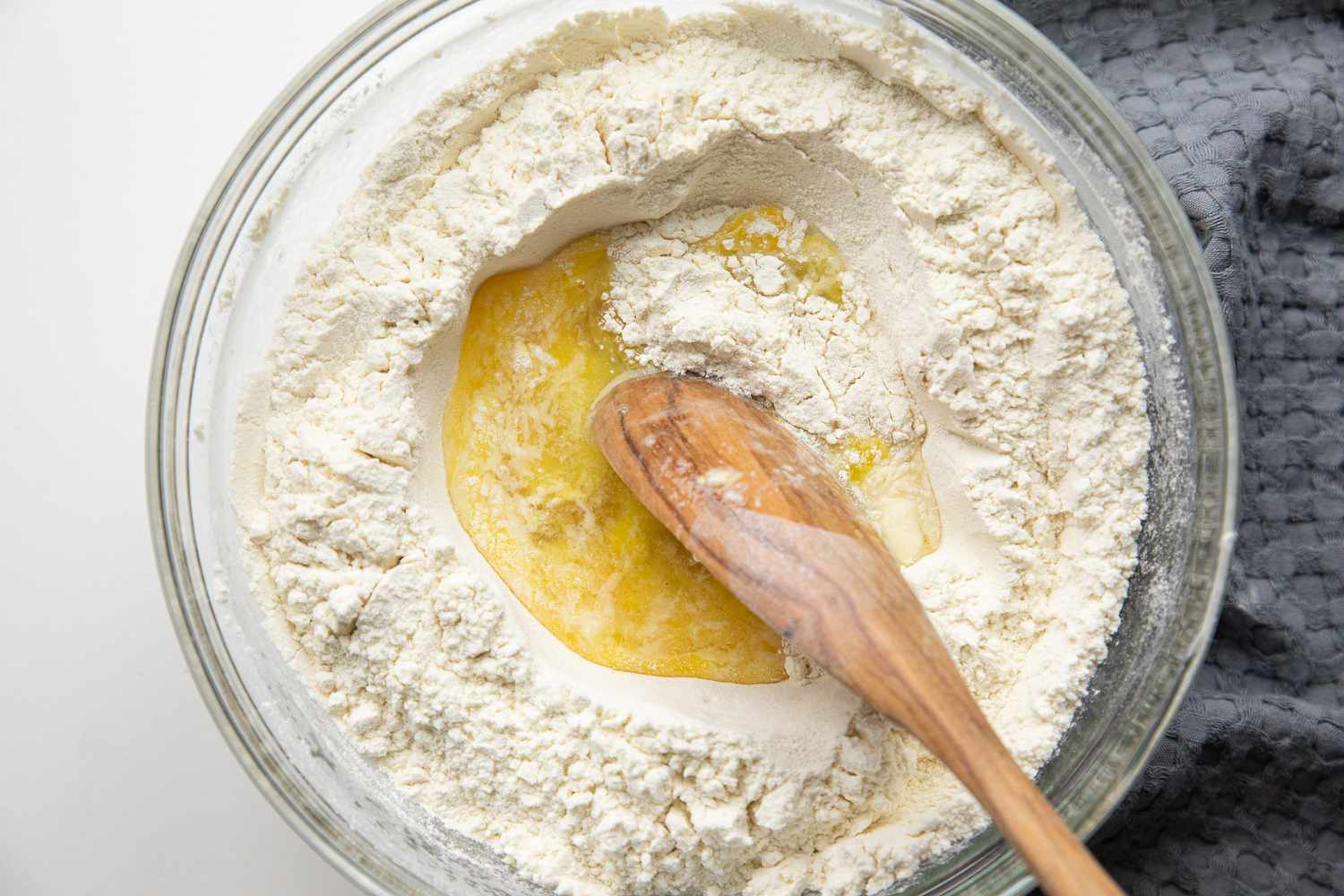 Eggs Yolks and Water Mixed into the Bowl of Dry Ingredients for Spaetzle Recipe