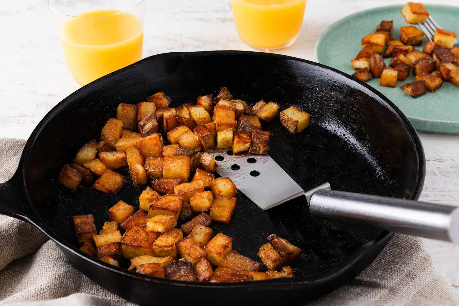 Dinner Style Breakfast Potatoes in a cast iron skillet