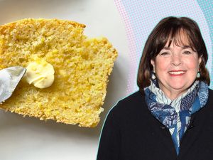 Ina Garten next to a piece of cornbread on a plate with butter and a knife
