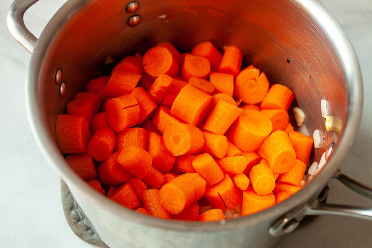 Cut carrots in a pot