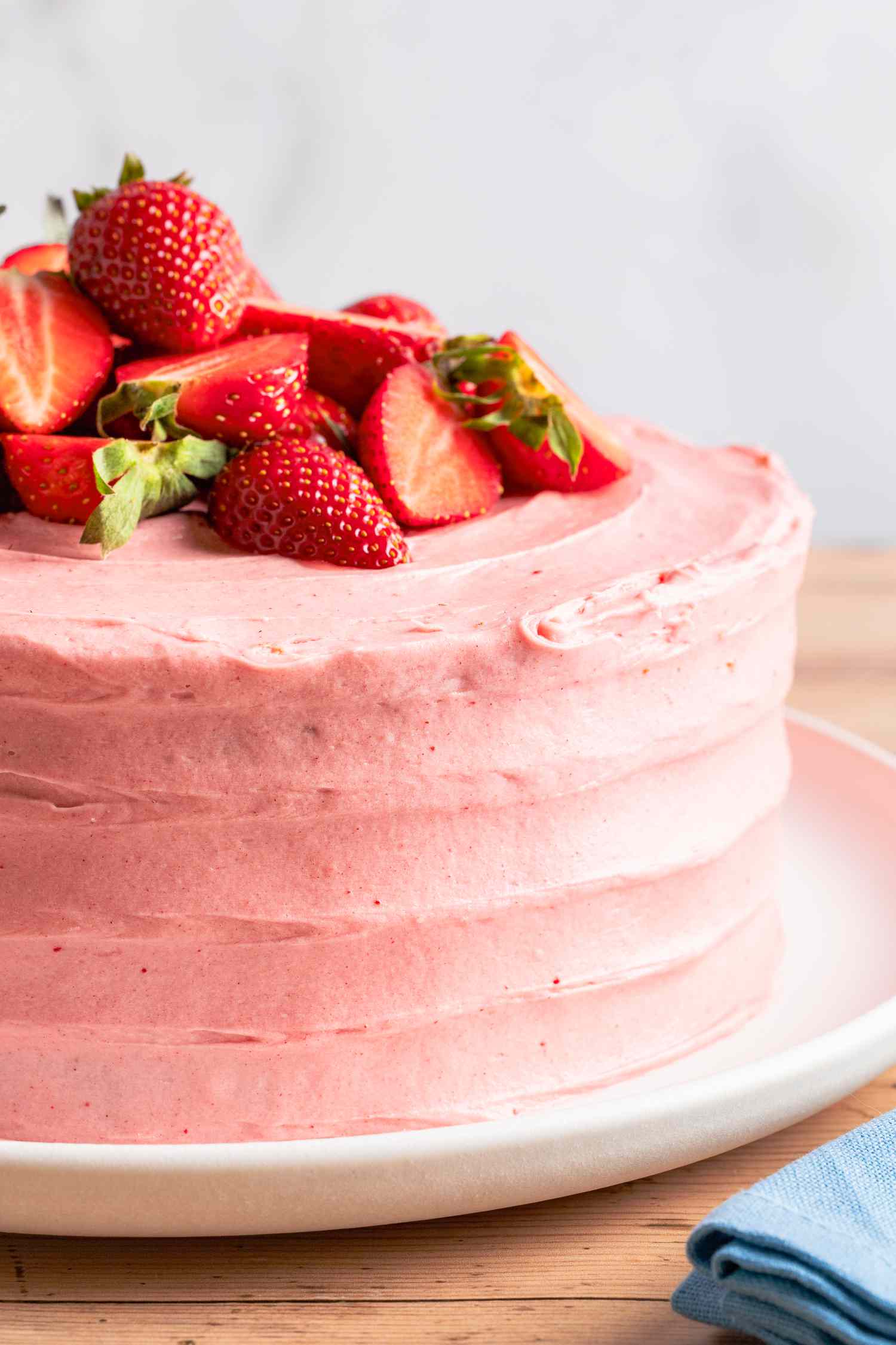 strawberry cake on a plate at a table