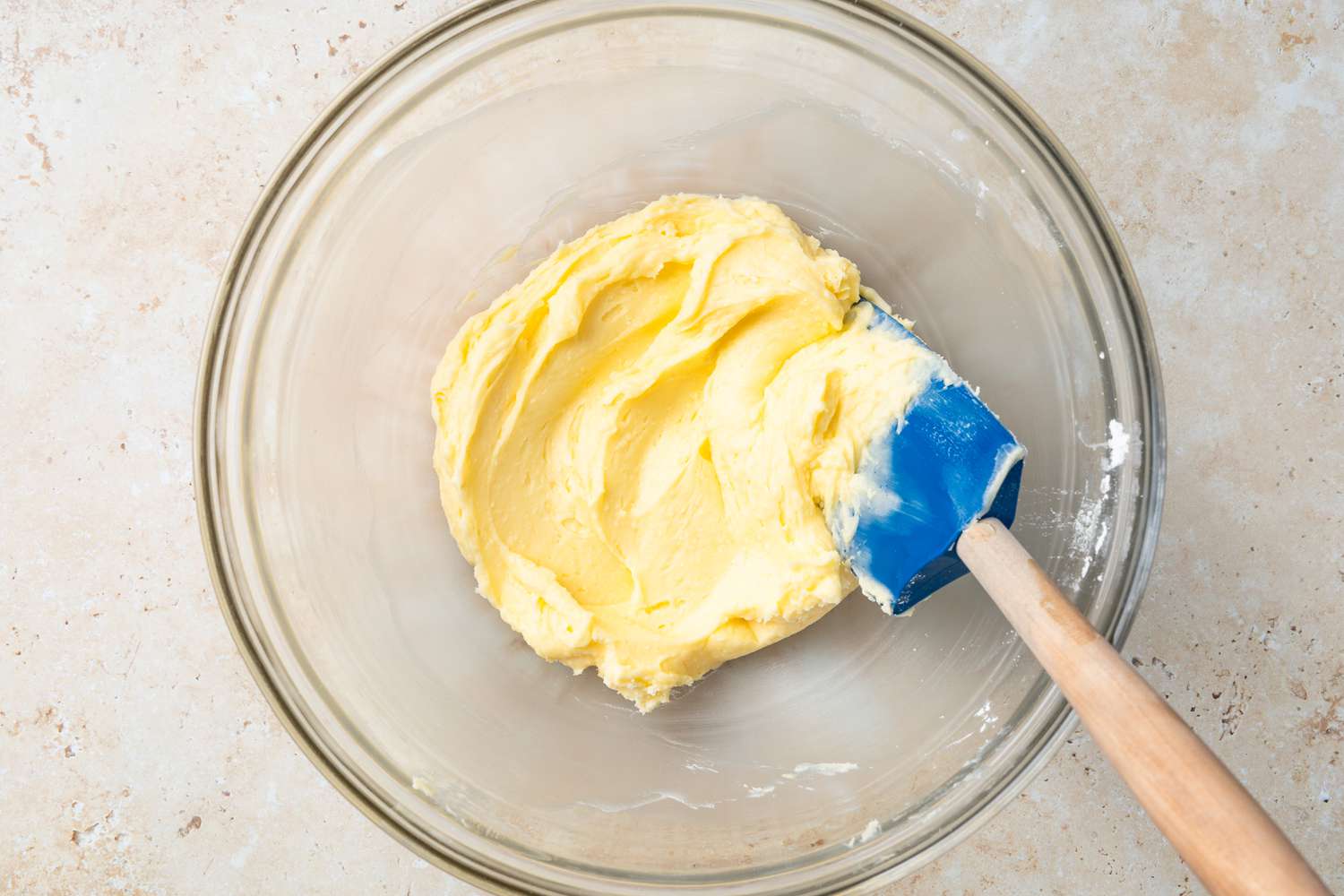 Desired Smooth Texture of Powdered Sugar and Butter Mixture in a Bowl With the Spatula