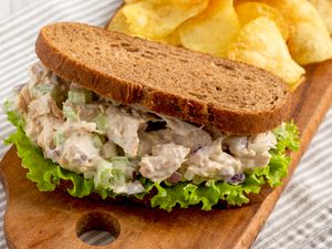 Chicken Salad Sandwich with Potato Chips, side view