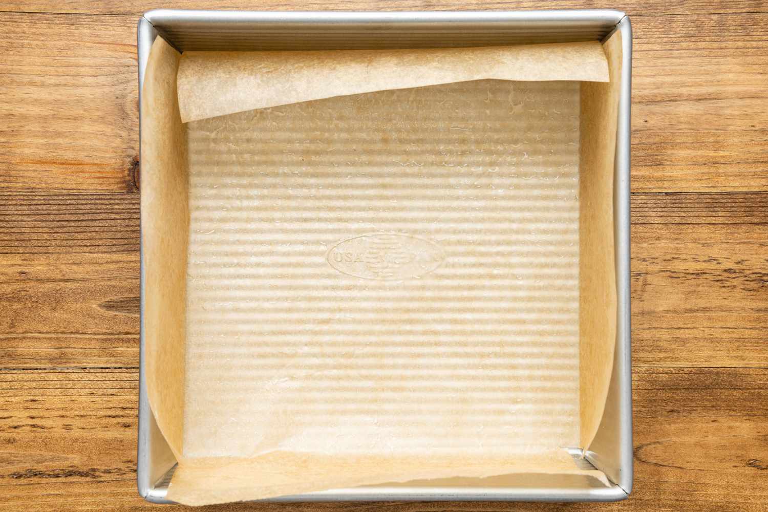 Square Baking Pan Lined With Parchment Paper for Turkish Delight Recipe