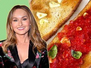 Giada De Laurentiis next to slices of tomato toast