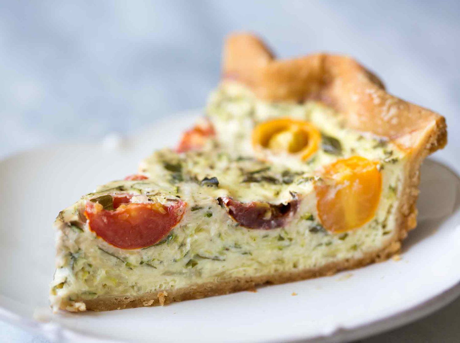 Zucchini and tomato quiche