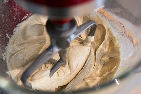 mixing dough for chocolate chunk cookies