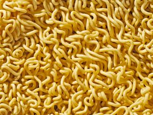 Dry ramen noodles in a closeup view showing their texture