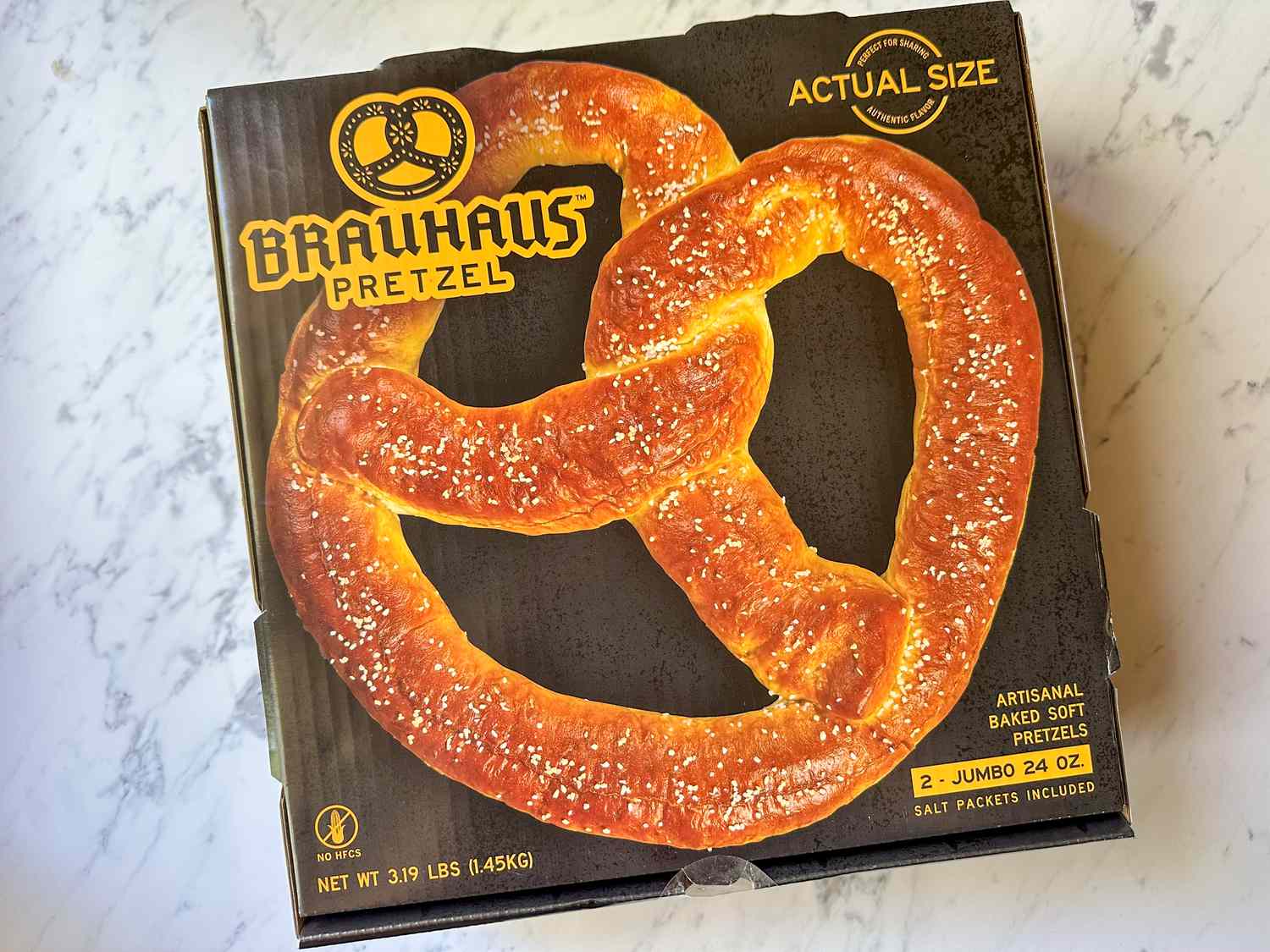 Packaging of a soft pretzel product featuring a large pretzel image on the front