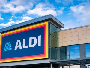 Aldi storefront with its logo visible on the sign