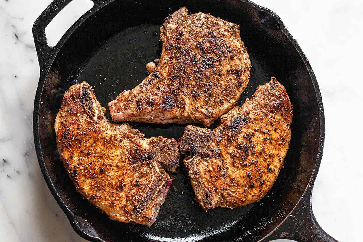 Pork Chop Recipe cook the chops in a cast iron skillet