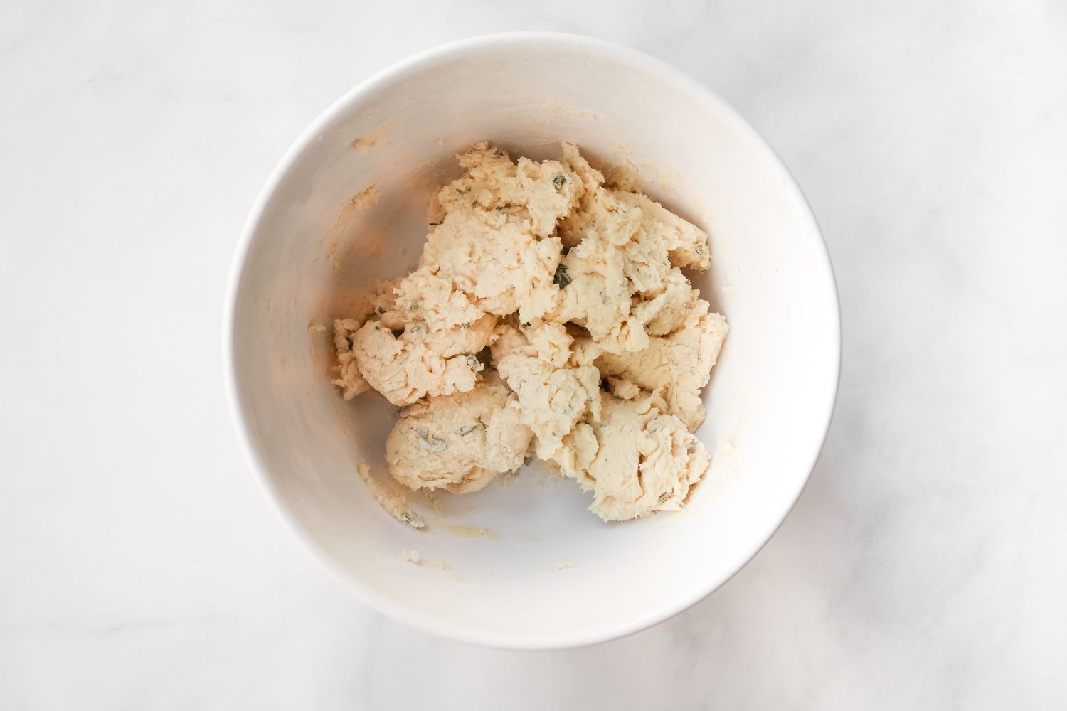 Biscuit down in a white bowl.