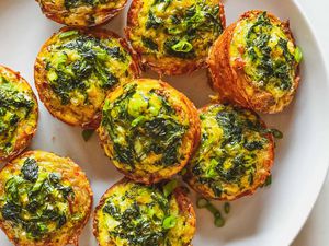 Top view of easy hash brown egg bites on a white plate.