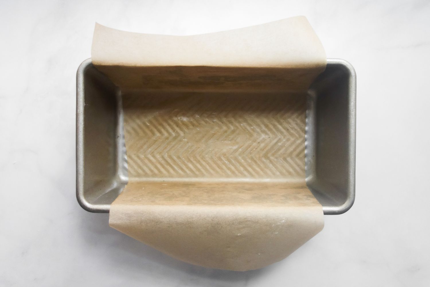 line a loaf pan with parchment paper