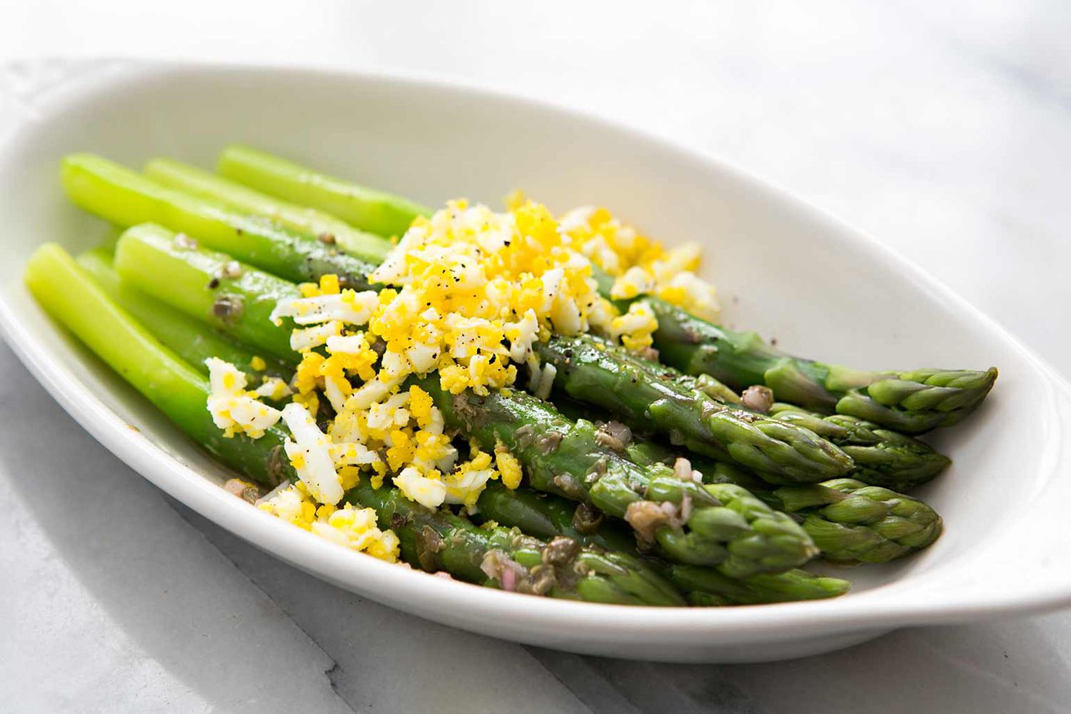 asparagus mimosa in a white dish