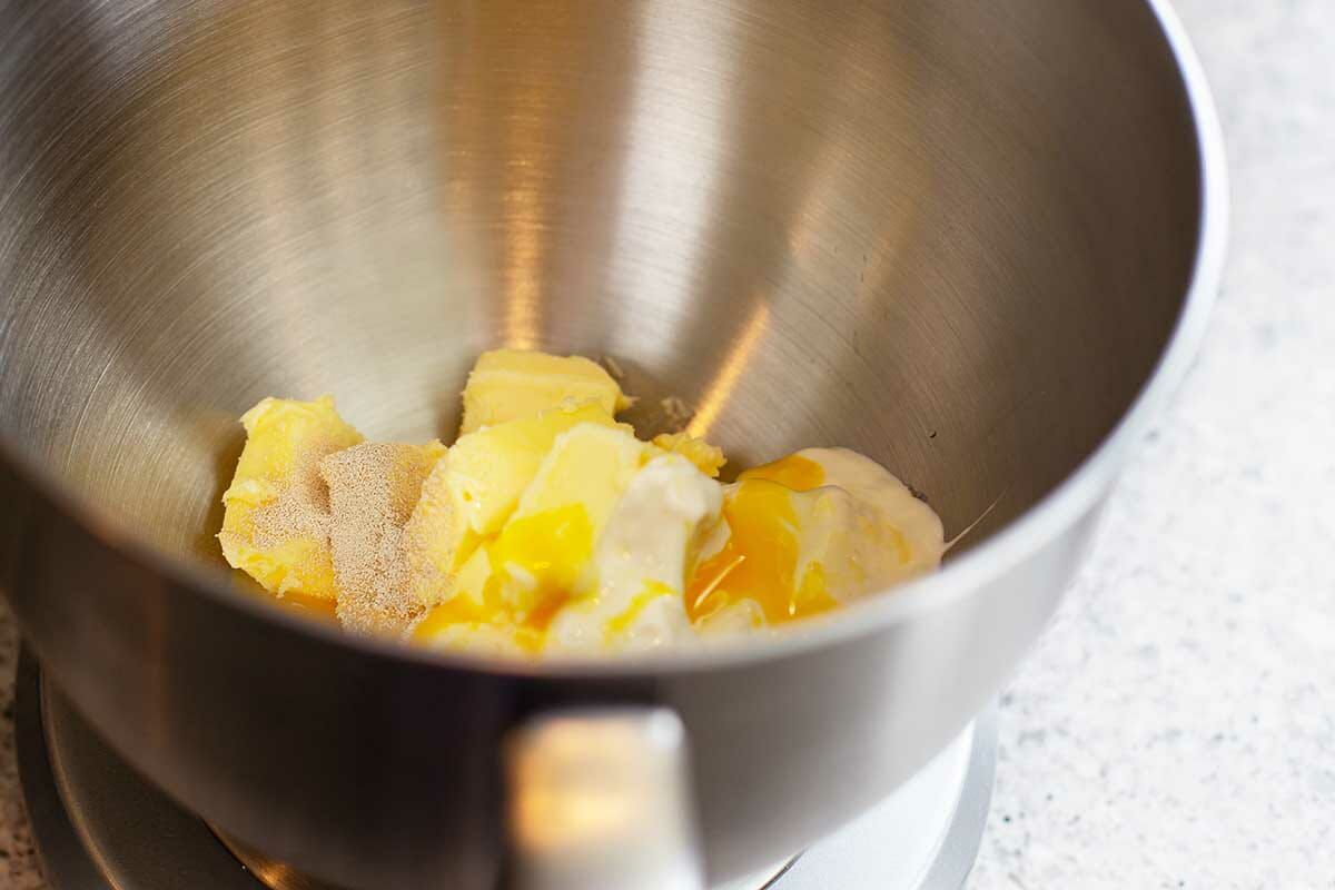 Butter and sugar in a metal bowl to make Hungarian Butter Horns.