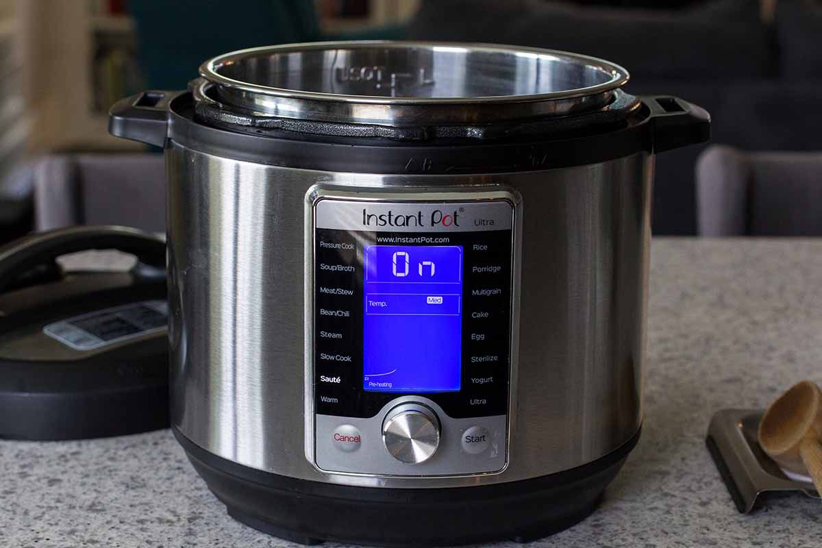 Photo of an instant pot with "ON" on the digital screen.