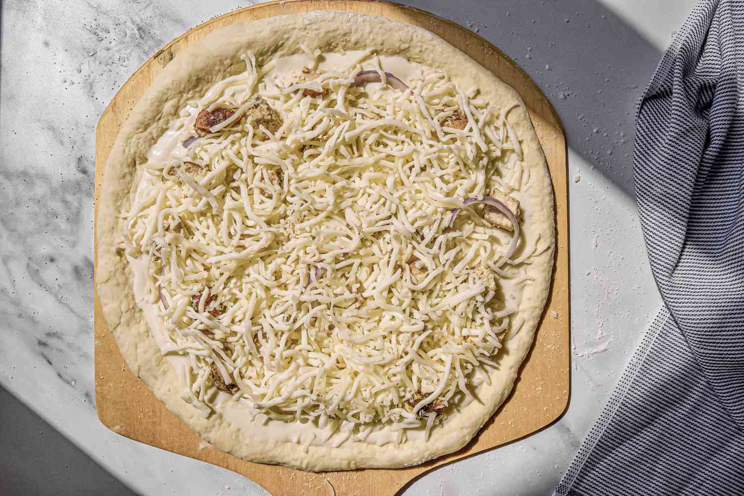 Cheese Added to the Pizza