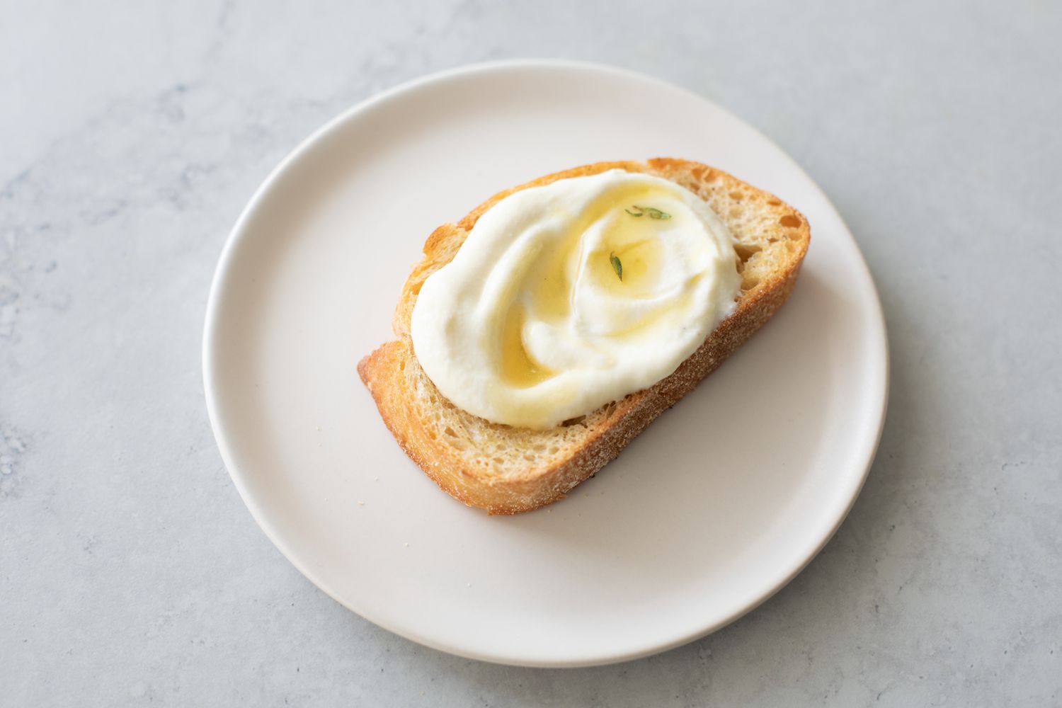 Whipped Ricotta Toast on a Plate