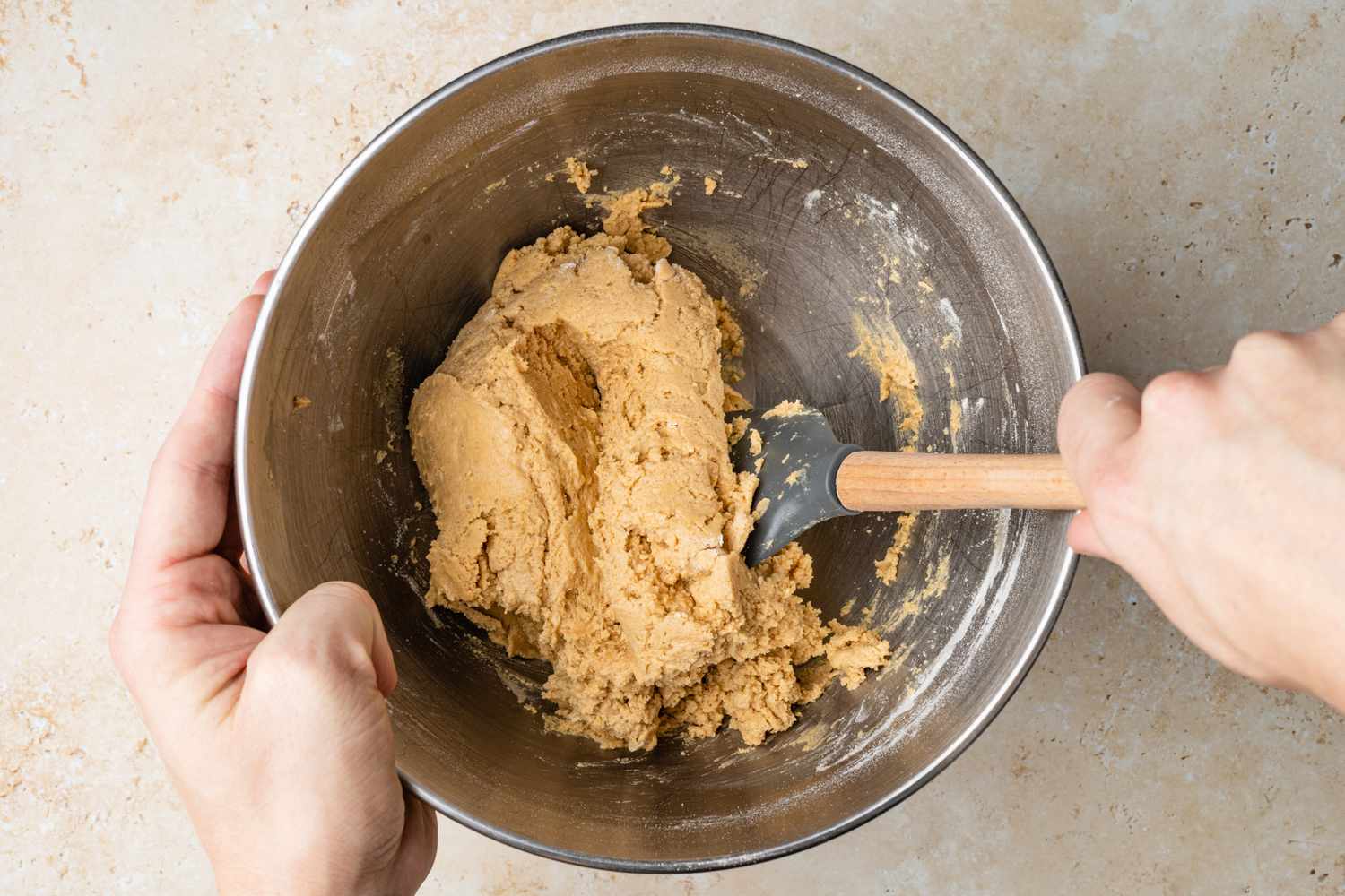 Peanut Butter Cup Cookie Dough Mixed Together Using a Spatula