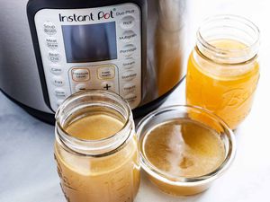 Instant Pot Chicken Stock - jars filled with chicken stock 