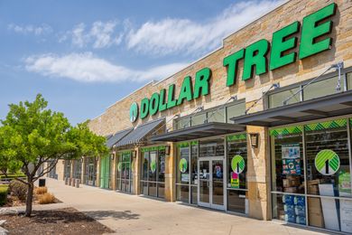 Exterior view of a Dollar Tree storefront featuring the store name on the building and an inviting entrance