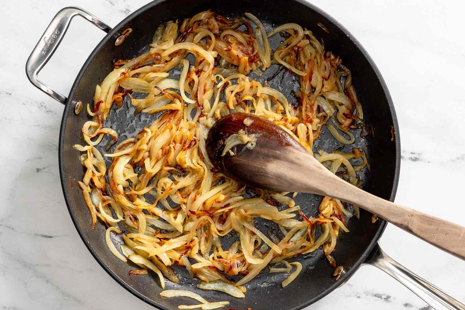 slightly caramelized onions in a pot for French onion pasta recipe