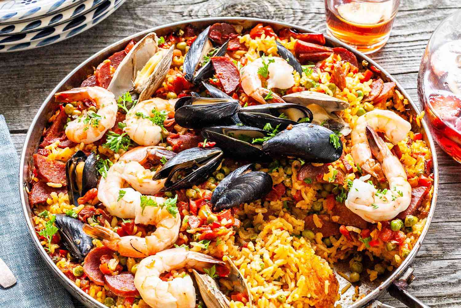 A seafood paella in a skillet, ready to serve