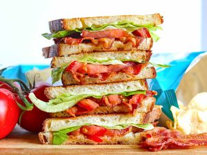 Four BLT Grilled Cheese sandwiches with toasty bread and crispy bacon