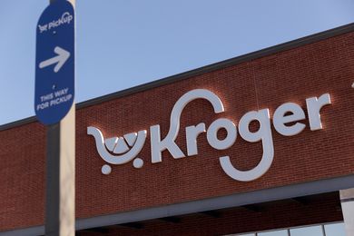 Kroger storefront with a pickup sign visible in the foreground