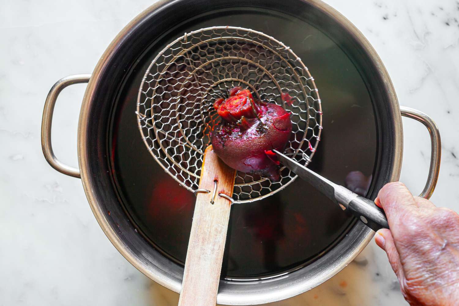 Beets Boiled in a Pot with One in a Spider Strainer Pierced with a Knife for Beet Chutney Recipe