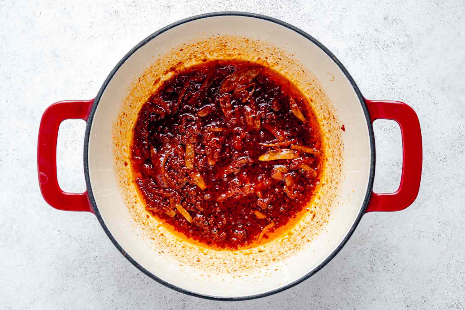 Tomato Paste Cooked in the Dutch Oven for Jollof Rice Recipe