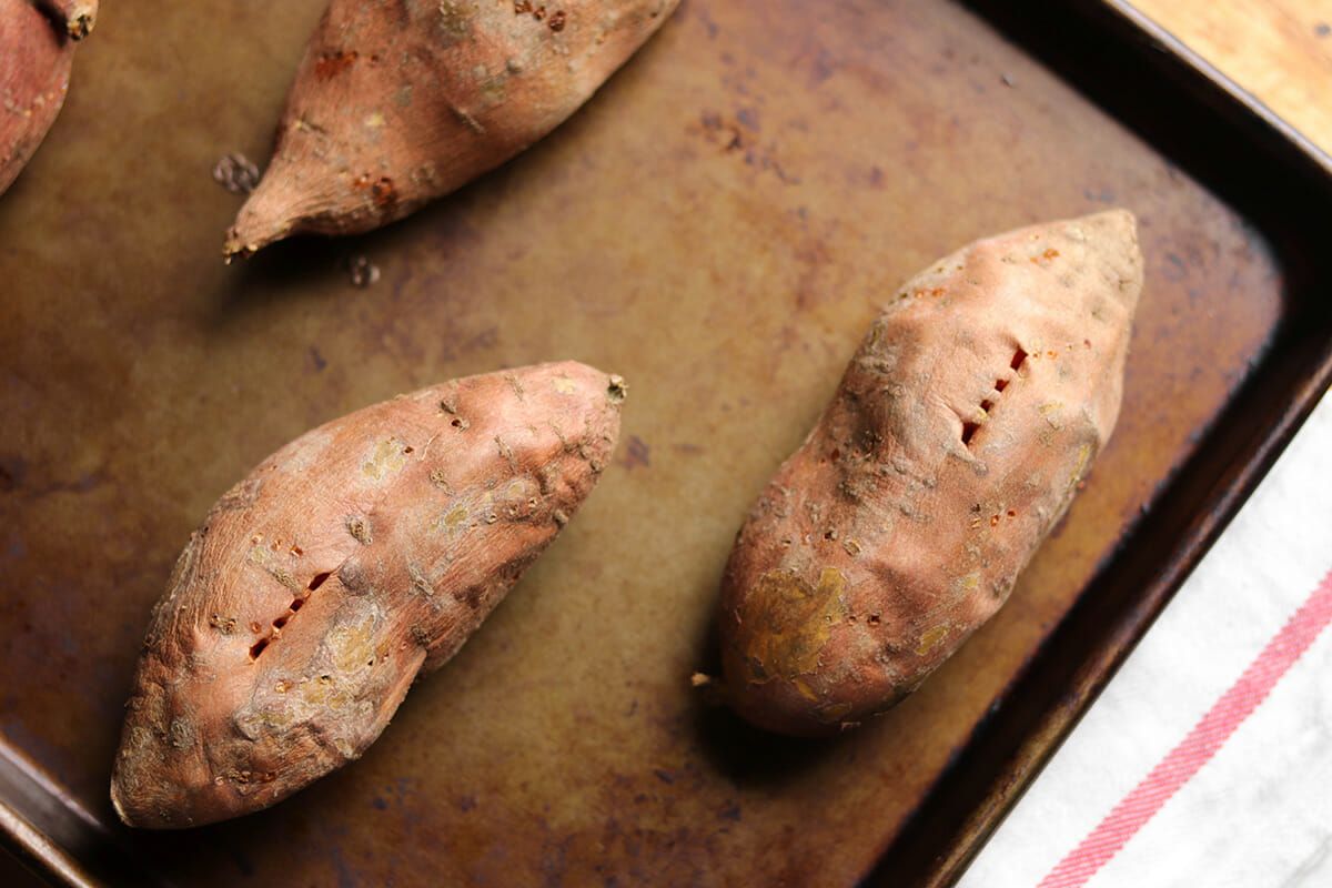 Baked Sweet Potatoes with Chorizo poke the potatoes