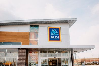 Exterior of an Aldi grocery store showcasing its entrance and signage
