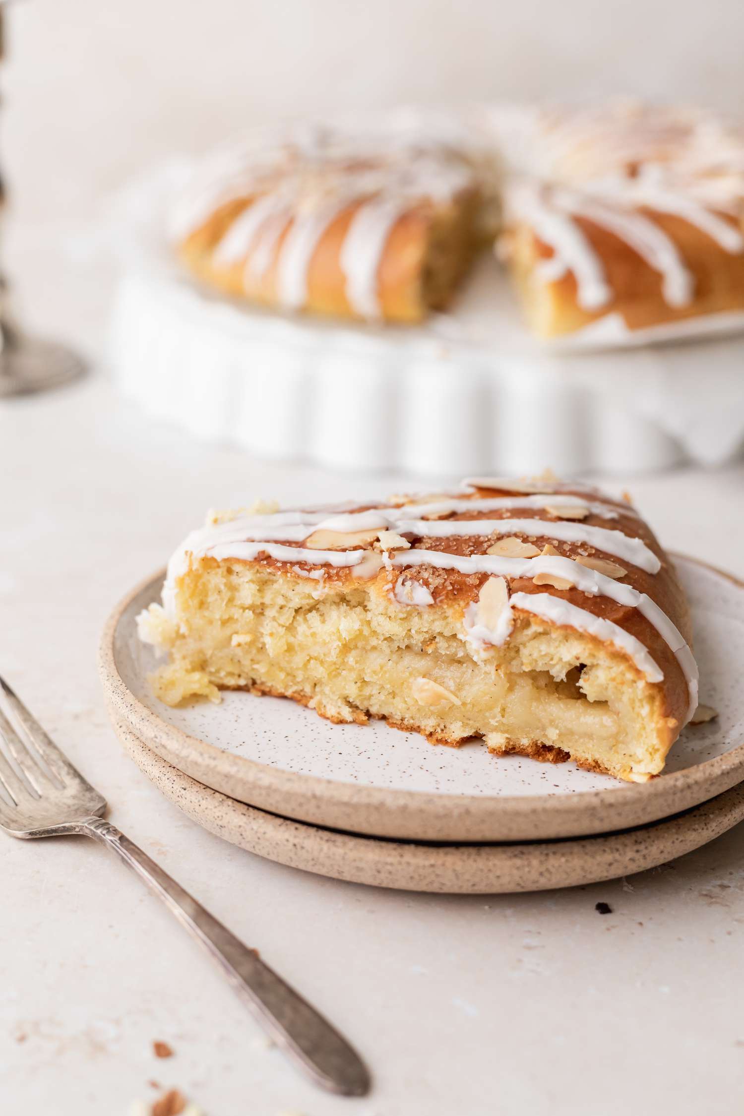 Side view of a slice of Danish kringle (smørkringle).