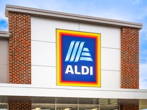 Exterior of an Aldi grocery store with its logo prominently displayed