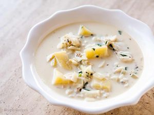 Fish chowder in a white bowl