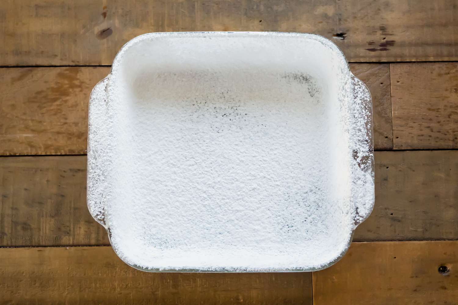Powdered Sugar and Cornstarch Mixture Dusted on Baking Pan for Vegan Marshmallows
