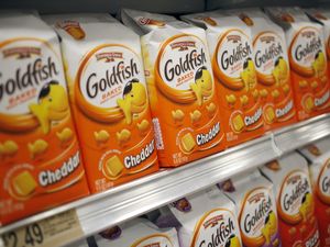 Packages of Goldfish cheddar crackers displayed on a grocery store shelf