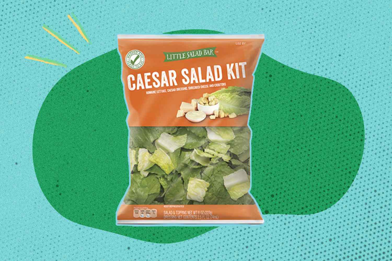 Bag of Little Salad Bar Caesar Salad Kit on a green and teal background, presented as packaged food