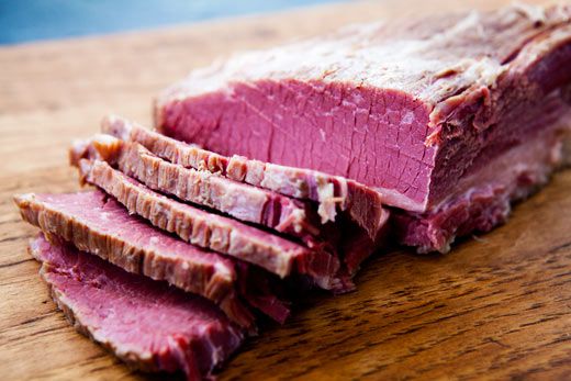 Corned beef sliced on a cutting board