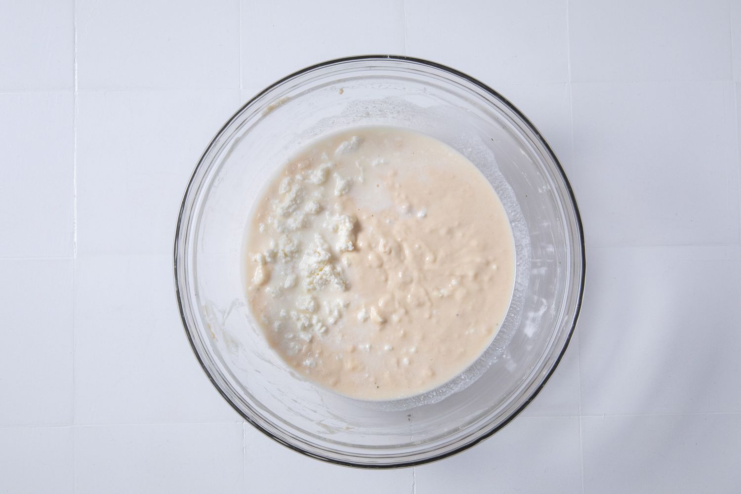 rest of the water and feta cheese mixed into the wet batter for batsaria recipe