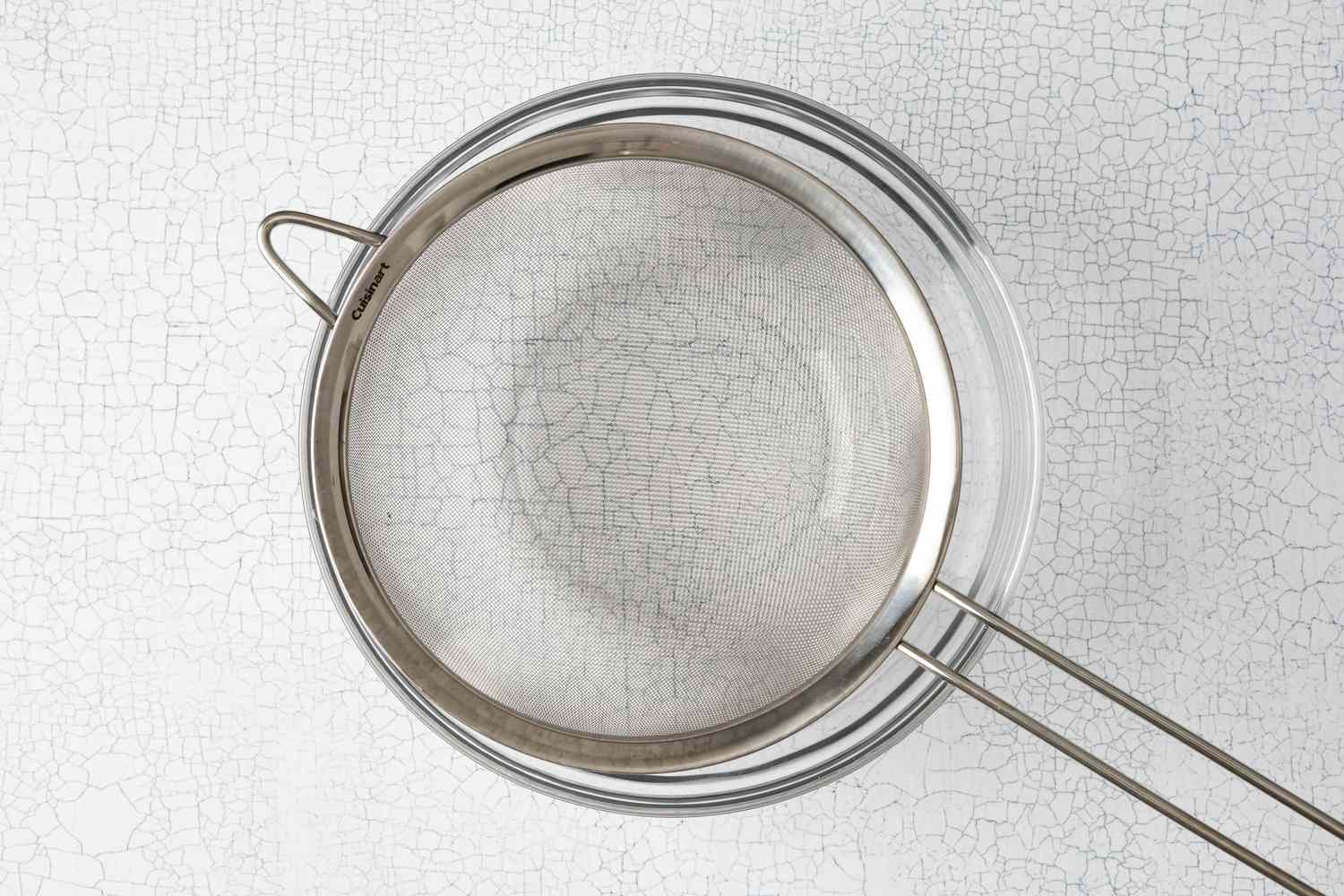 Bowl with a Strainer for Vanilla Pudding Recipe