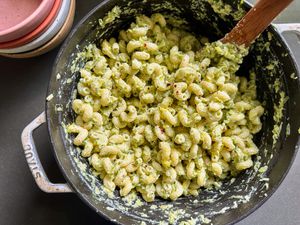 5-ingredient zucchini pasta in a pot with a wooden spoon