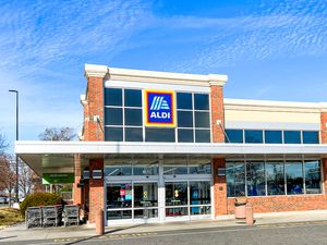 The exterior of an Aldi supermarket entrance