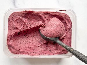 Frozen yogurt in a clear tub