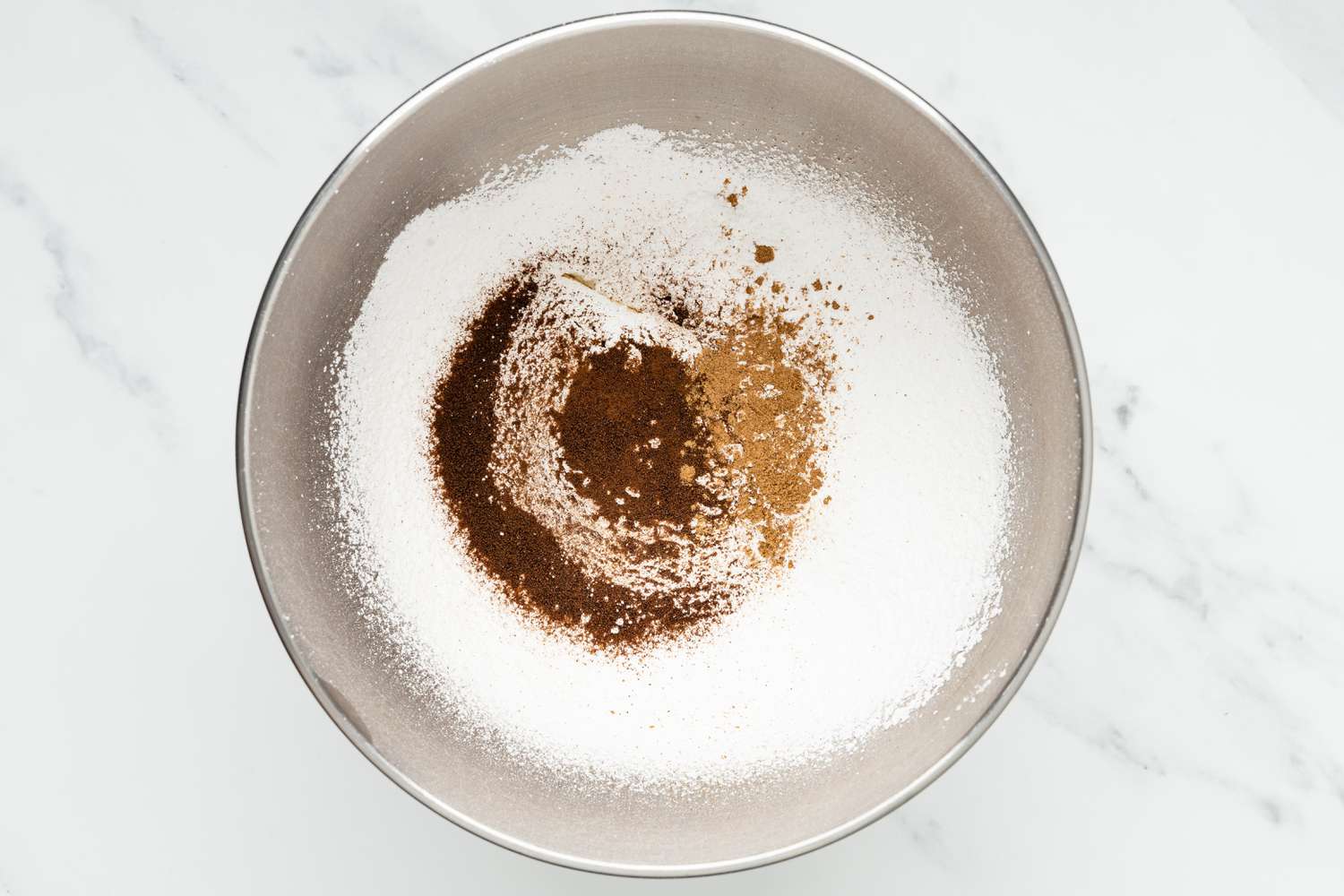 Dry Ingredients for Frosting Added to a Mixing Bowl 